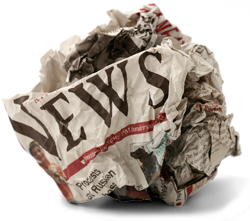 Newspaper crumpled up
